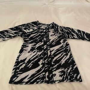 Black and white sun jacket. Silky fabric with sun protection and full zipper.